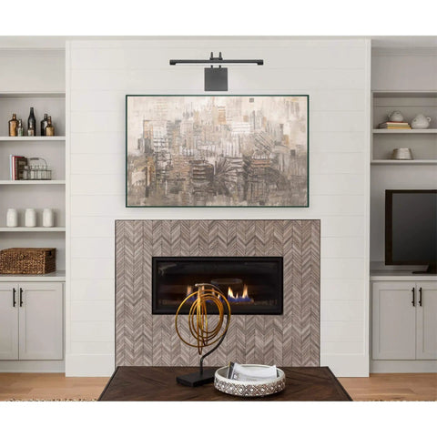 Living room art above fireplace with hardwired 17 inch LED picture light dimmable matte black 3000K with 794 lumens installed.