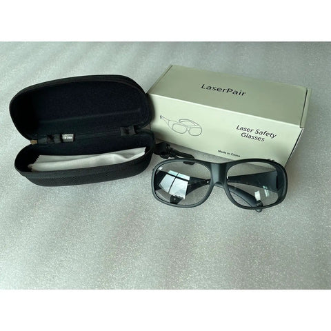 Top Tier Curved CO2 Laser Safety Glasses Packing Knockout 10600NM OD6 Shielding And Tight 90PCT VLT Clarity in protective case.