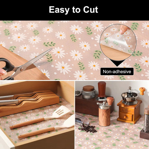 Non Adhesive Eva Shelf Liner Kitchen Cabinet And Drawer Protector Easy Cut Length shown with scissors cutting daisy-patterned mat.