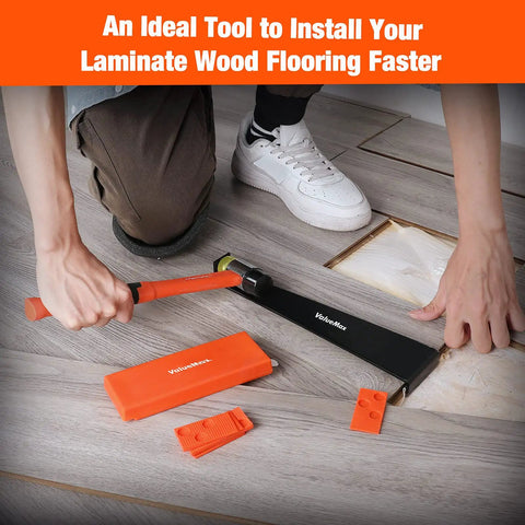 Laminate Wood Flooring Installation Kit With Reinforced Double Faced Mallet, pull bar, and tapping block in use on floor
