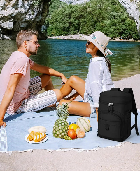 22L Insulated Leak Proof Cooler Backpack for Beach Picnics Camping and Travel with Heavy Duty PEVA Liner shown on a picnic blanket