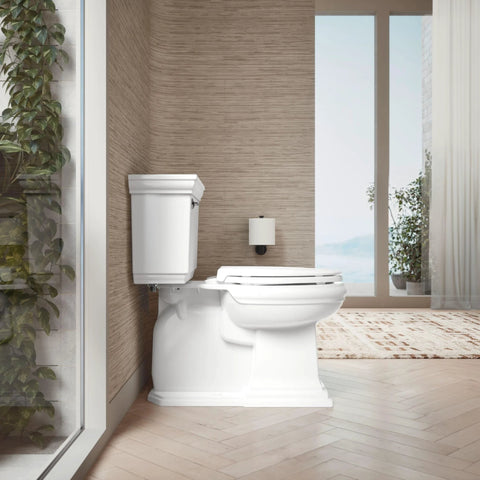 KOHLER Cachet elongated toilet in white with closed lid, installed in a modern bathroom.
