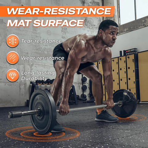 Athlete lifting weights on thick 0.56 inch interlocking gym flooring mats with rubber top for home gym use, installed view.