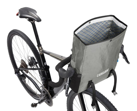 MULE 12 Bikepacking Handlebar Bag IPX5 Waterproof Roll-Top With Aluminum Stabilizer Bar mounted on a bike, color Wolf Grey 2.0