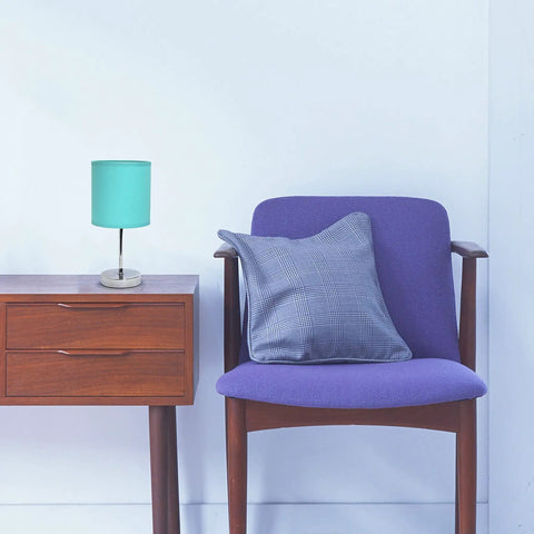 Blue Turquoise Chrome Mini Table Lamp With Fabric Shade, Compact 11.8 Inch Tall, E12 Candelabra Base, next to chair.