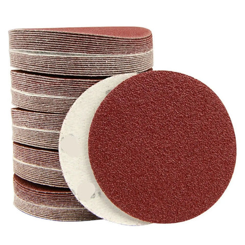 Premium 25 Piece Hook And Loop Sanding Discs Assorted Kit For Metal Wood And Auto Detailing With Durable Abrasive Sheets In 60 To 3000 Grit Sizes From 50mm To 200mm For Super Smooth Polish Jobs No More Rough Surfaces stack of sanding discs in various sizes and grits