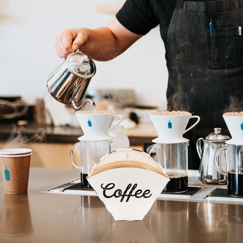 Enamelware Coffee Filter Holder Wall Mount Cone Shaped White Vintage Farmhouse Style Filter Storage Container on counter
