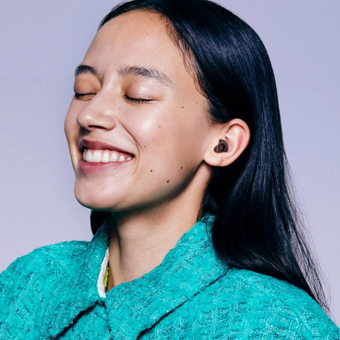 Woman wearing Engage Plus Earplugs For Clear Chat And Chill Noise Reduction At Hangouts And Chats Great For Parenting Moments Includes 8