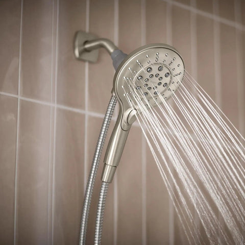 Spot Resist Brushed Nickel Six Function Five And A Half Inch Handheld Showerhead With Magnetic Docking System spraying water