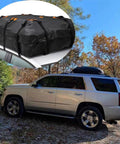 Waterproof Roof Cargo Bag For SUVs And Family Road Trips with Upgraded 600D Fabric and Reinforced Seams, mounted on vehicle