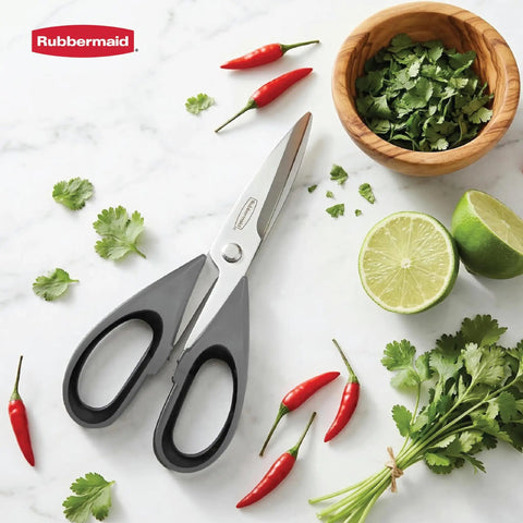 Heavy Duty Stainless Steel Kitchen Scissors With Comfy Non Slip Grip And Reliable Safety Sheath Rust Resistant Chef Shears used for fresh herbs and chili peppers on a countertop.