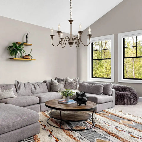 Living room view with Six Light Farmhouse Chandelier in Oil Rubbed Brown and White Finish, enhancing rustic chic décor.