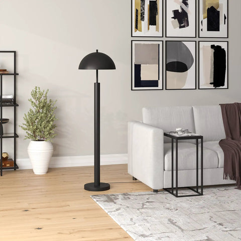 58-Inch Mid-Century Modern 1-Light Floor Lamp With Blackened Bronze Dome Shade next to a white sofa in a living room.