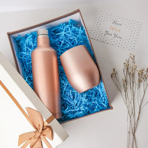 Top Shelf White Crinkle Paper Shreds And Gift Basket Filler No Brainer Cushioning Material For Shipping Boxes And Crafts Killer Value Packing Stuffing Option For Creative Folks in a gift box with blue shredded filler.