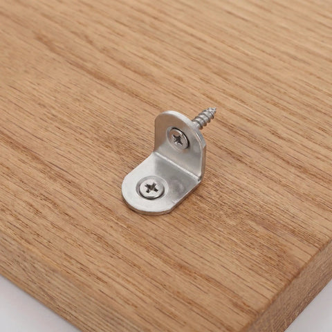 Beefy Stainless Steel Right Angle Bracket Set With Screws For Heavy Duty Wood Joints on wooden surface, close-up view