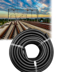 Top Tier Flame Retardant Corrugated Wiring Conduit for Heavy Duty Cable Protection coiled in front of railway tracks.