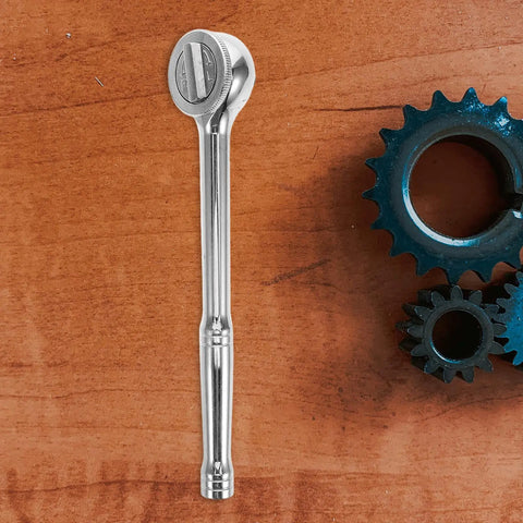 Heavy Duty 3/8 Inch Drive Ratchet Socket Wrench With Smooth Reversible Action And Quick Release Handle on wooden background.