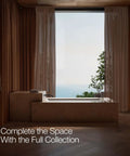 Minimalist bathroom with open window view, featuring Components Wall Mount Bath Spout Non Diverter Matte Black Finish.