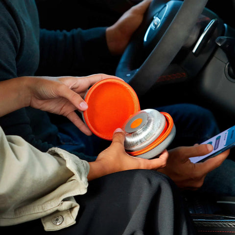 V16 Approved Led Emergency Warning Beacon offering knockout night visibility in a hand-held case inside a vehicle.