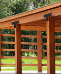 Heavy Duty Steel Post Bracket Repair Kit Featuring Four Tough As Nails Mending Plates, Fifty Six Corrosion Resistant Screws, And A Socket Wrench For Quick No Sweat DIY Fence And Pergola Repairs on a pergola structure.