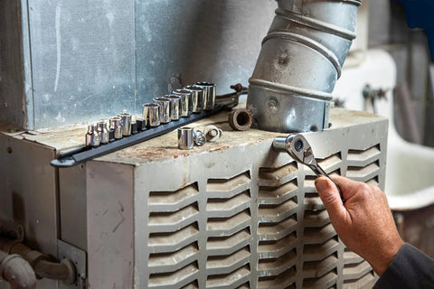 Person using Three-Eighths Inch Drive 12 Point Standard Socket Set SAE 13 Piece With Off-Corner Loading Design Chamfered Opening Guides