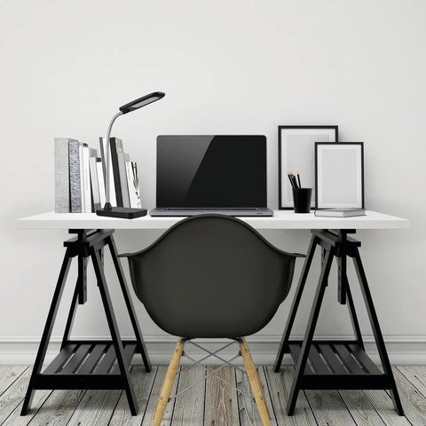 Ross 16 Inch Integrated LED Desk Lamp In Matte Brass With Dimmable Rotary Switch on desk with laptop and books