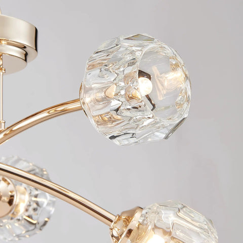 Close-up of Spuntnik Crystal Ceiling Light Fixture with Six G9 Base Bulbs, clear crystal shade and shining gold finish metal frame