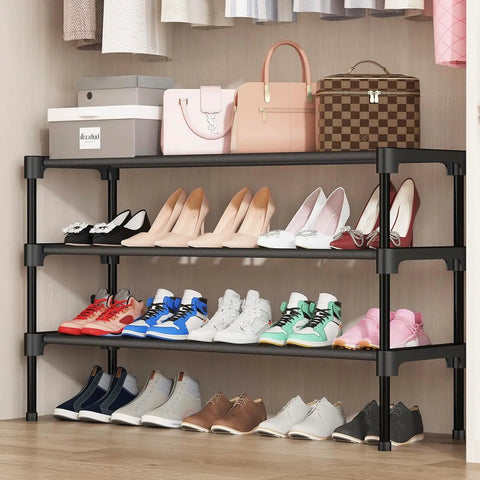 Solid Two Tier Shoe Rack For Entryway And Garage, Roomy Stackable Footwear Organizer With Rust Proof Steel Frame, features various shoes in a compact closet setup.