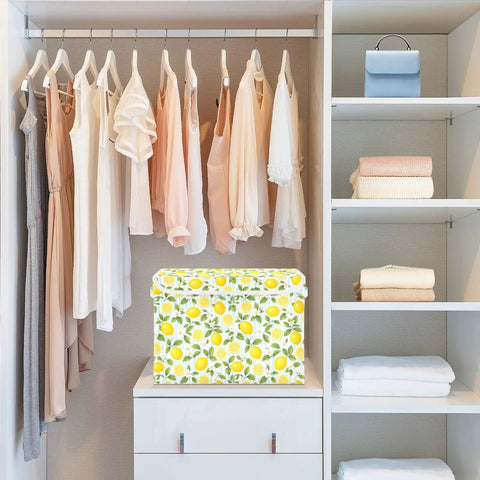 Heavy Duty Foldable Storage Bin With Secure Snap Lid And Wide Grip Handles For Bedroom Closet Organization in a clean closet.