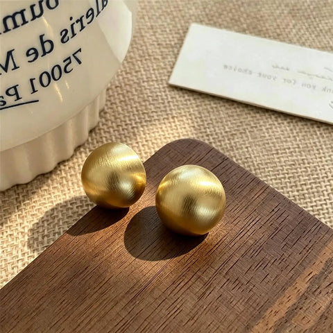 Bold Gold Round Earrings For Women Featuring A Chunky Wide Half Ball Design Lightweight Studs For Everyday Wear Dope Party Ready Glam Vibe Trendy Circle Hoop Look Essential Accessory For Chic Street Style, gold stud pair