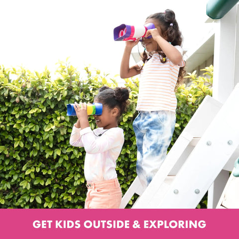 Children using Pink Kidnoculars Lightweight Kids Binoculars For Outdoor Adventures For Ages Four To Eight on a play structure.