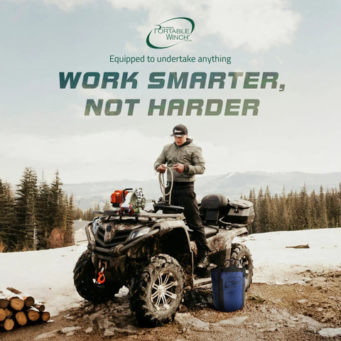 Kickass Gas Powered Capstan Winch Packing A Hella Tough 2200 Pound Pull Capacity on ATV in snowy landscape preparing for towing.
