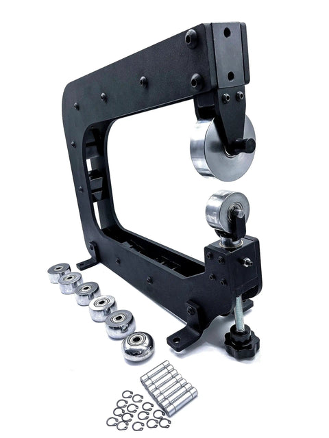 Real Deal Mini English Wheel Featuring 15 Inch Throat Depth And Seven Piece Anvil Wheel Set, showing rollers and components for auto body shaping.