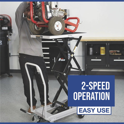 Heavy Duty Hydraulic Table Cart With Fast Two Speed Lift And 1000 LB Capacity lifting a tool with smooth rolling wheels in a garage setting.