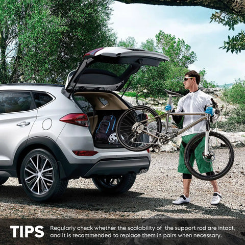SUV with open trunk showcasing installation of Beefy Rear Hatch Trunk Lift Supports Gas Spring Shocks Set Of 2 For Challenger