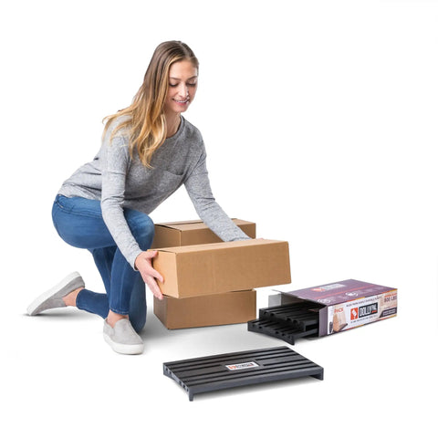 Built Tough Hand Truck Helper And Mini Storage Pallet Deck Made For Smooth Sailing On Concrete Floors With Serious Weight Carrying Power For Heavy Jobs Three Pack, woman using hand truck helper with boxes.