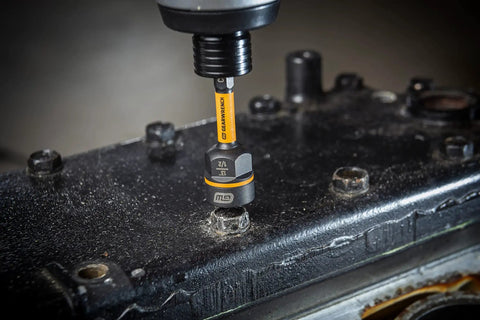 16 Piece Bolt Biter Nut Extractor And Driver Set with bi-directional removal in use on damaged fastener in durable torsion zone