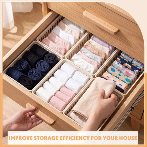 Bulk Set Of Six Small Beige Plastic Storage Baskets Perfect For Desk Drawer And Countertop Tidy Organization in a drawer with socks.