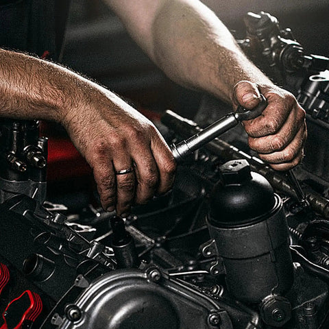 Using Tough As Nails 11 Pc Socket Set And Hex Wrench Kit for precision work in engine compartment.
