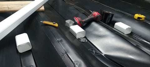 Dry Under Deck Drainage System Roll For 50 Feet, Fits 12 Inch Joists, 30 Mil Thick Black Trough Top, White Downside with tools