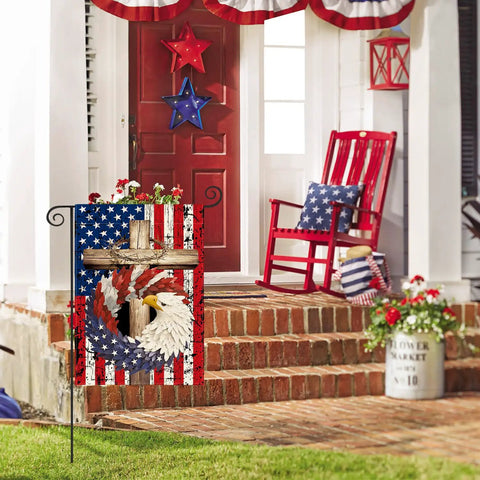 Patriotic Stars And Stripes Eagle Wreath Garden Flag 12x18 Inch Double Sided Outdoor Flag displayed on porch with red chair