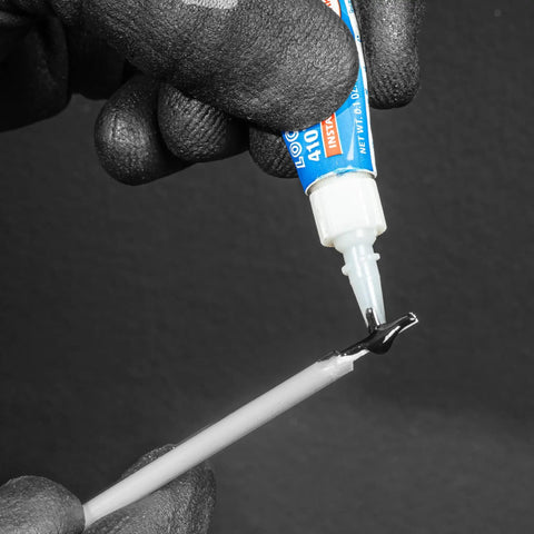 Applying adhesive to S Class Fish Tape Field Replacement Leader With Fiberglass Construction, for electricians
