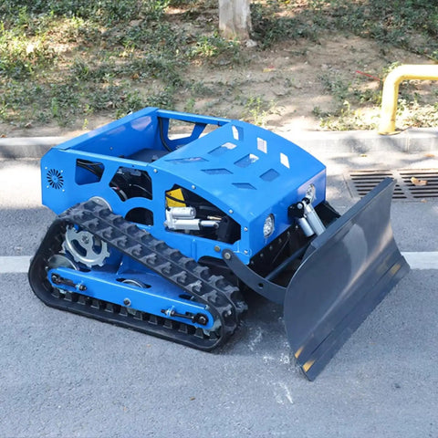 Remote Control Lawn Mower With RC Tracks For Slopes And Uneven Ground on asphalt surface, blue heavy-duty unit with tracks.