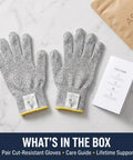 Cut Resistant Kitchen Gloves ANSI A5 Level 5 HPPE For Mandoline Slicing And Oyster Shucking Food Safe Super Grippy Durable Hand Protection For Chefs And Home Cooks Comfort Fit, shown with care guide and packaging on a marble surface.