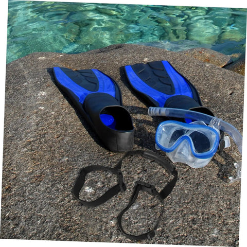 Diving fins, mask, and Stretchy Diving Tank Cylinder Band Retainer for Scuba Gear on a rock by the sea