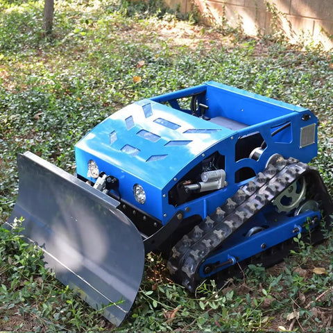 Remote Control RC Tracked Lawn Mower For Slopes And Uneven Terrain in blue with heavy duty tracks, shown on grassy terrain.