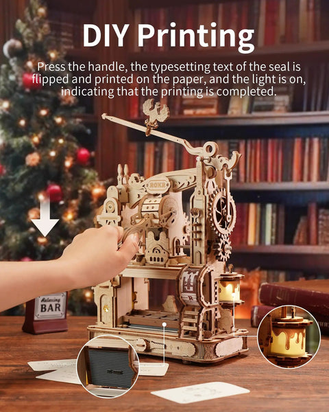 3D Puzzle Kit For Adults Wooden Printing Press Model Building Kit With 303 Pieces, DIY Wood Craft, STEM Hobby Toy, Includes Illustrated Manual, Screwdriver, Spring, And Custom Rubber Stamp Set For Creative Hands On Fun. Wooden printing press model in use