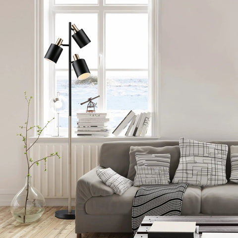 67 Inch 3-Light Tree Floor Lamp With Matte Black Finish And Brass Accents in modern living room setting, adjustable pivoting heads