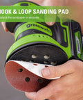 Close-up of hook and loop pad replacement on Cordless 24V 5-Inch Random Orbital Sander Kit With Variable Speed, 2Ah Battery And Charger Included