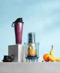 Personal Cup Adapter Kit For Full Size Blenders, BPA Free And Dishwasher Safe with two 20 oz cups shown with fruit blend